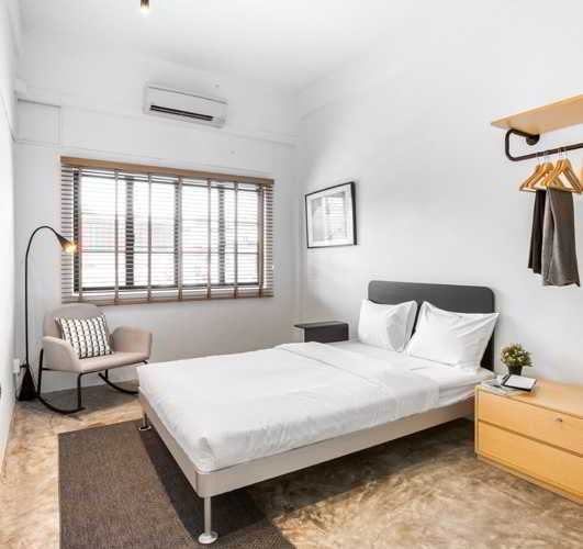 Modern Bedroom with Armchairs and Queen Bed