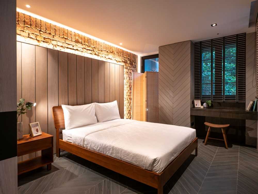 Country Bedroom with Cove Lighting and Bedside Table