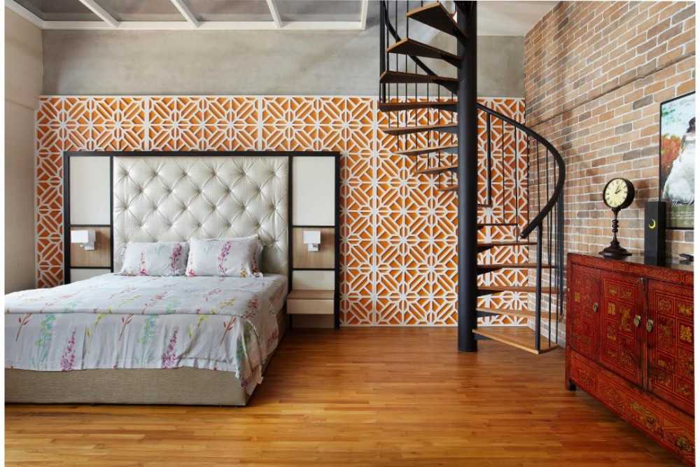 Eclectic Bedroom with Wood Flooring and Staircase