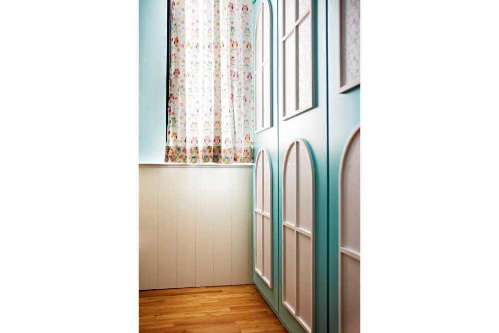 Eclectic Kids Room with Wood Flooring and Children's Storage