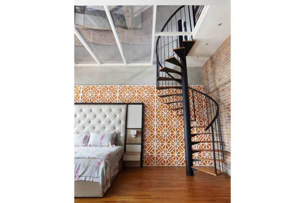 Eclectic Bedroom with Staircase and Queen Bed