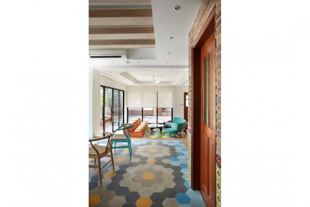 Eclectic Hallway with Rugs and Doors