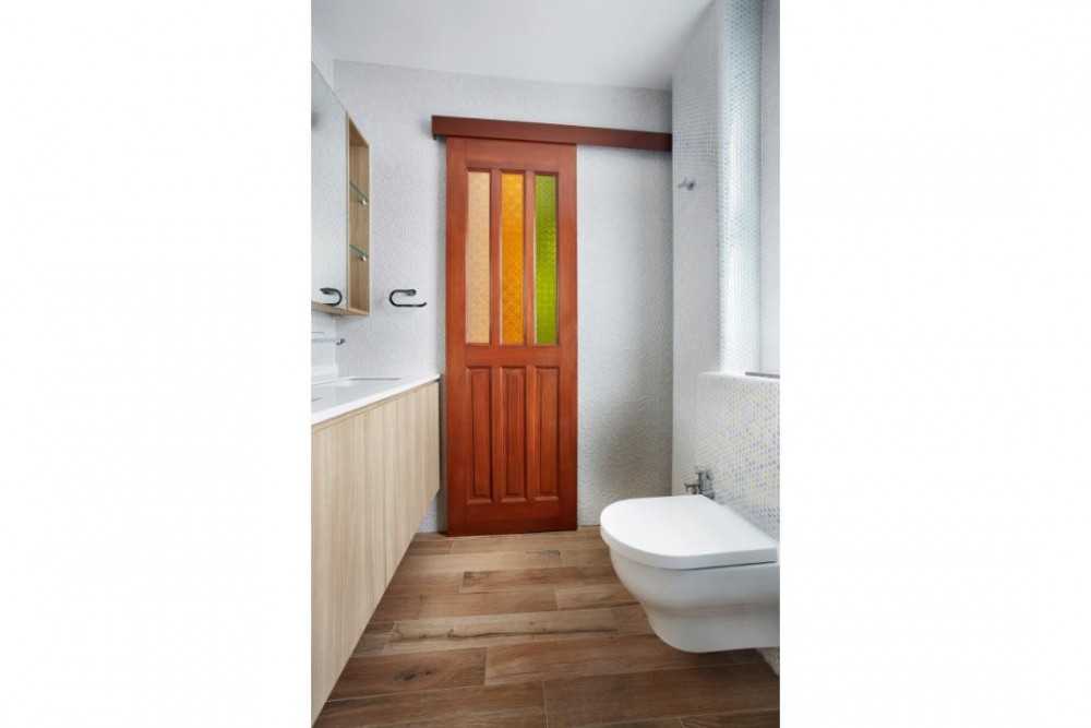 Eclectic Bathroom with Doors and Sliding Door