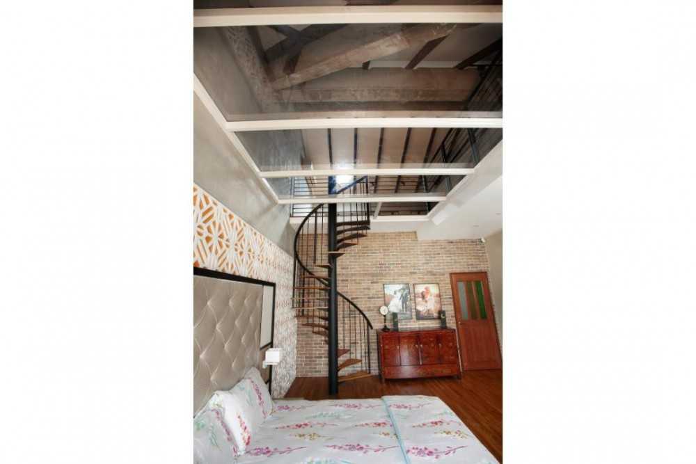 Eclectic Hallway with Staircase and Sideboard