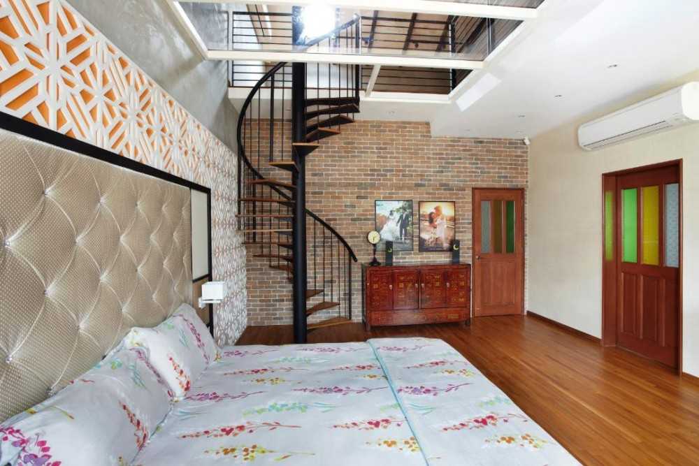 Eclectic Bedroom with Staircase and Sideboard
