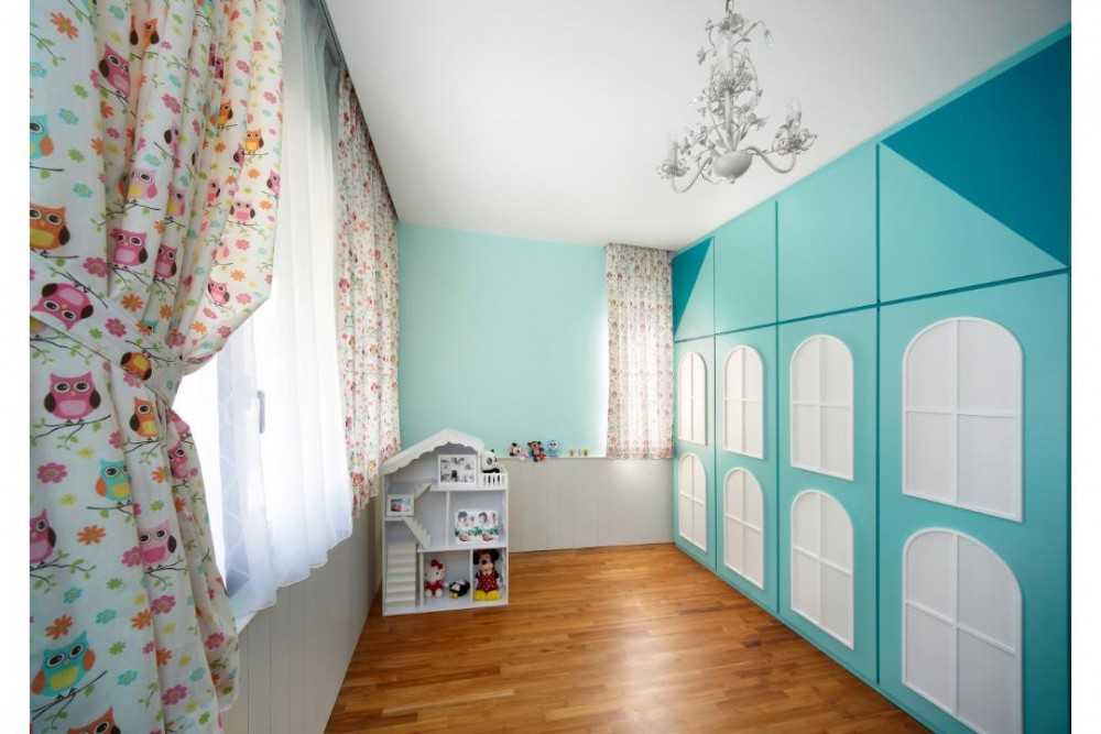 Eclectic Kids Room with Wood Flooring and Children's Storage