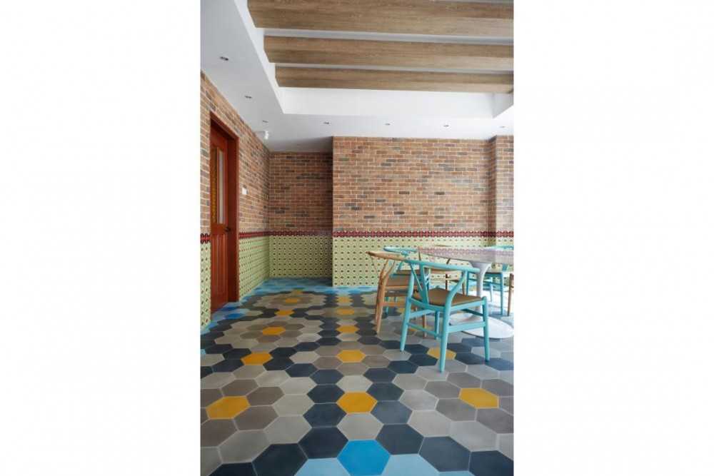 Eclectic Hallway with Feature Wall and Brick Feature Wall