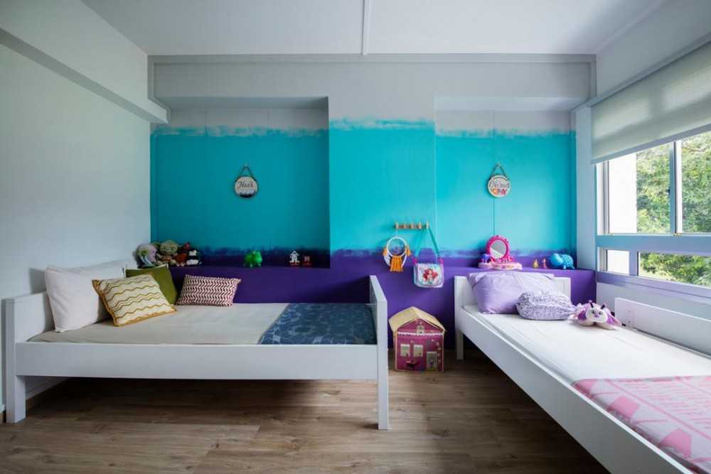 Eclectic Kids Room with Wood Flooring and Feature Wall
