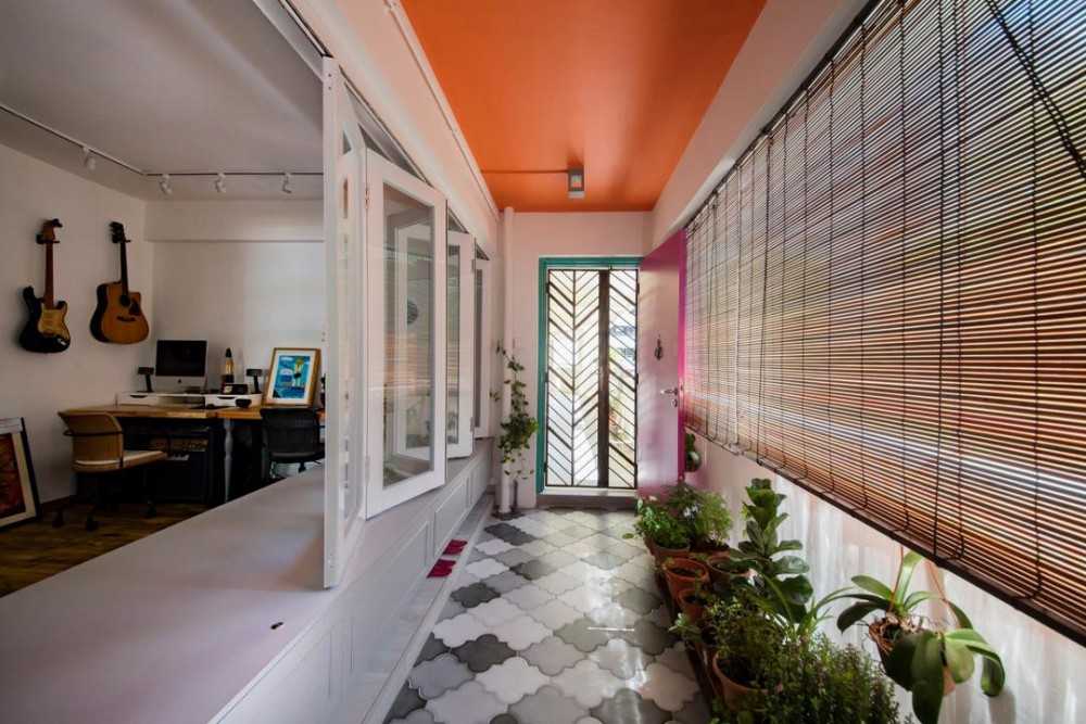 Eclectic Entryway with Room Divider and Lighting