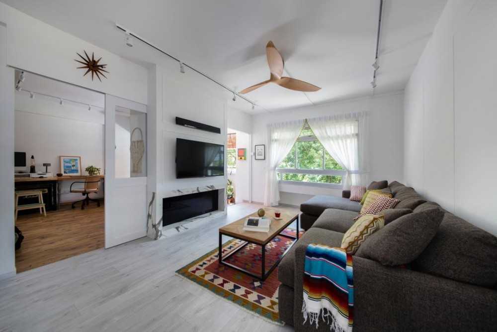 Eclectic Living Room with Ceiling Fan and Sofa