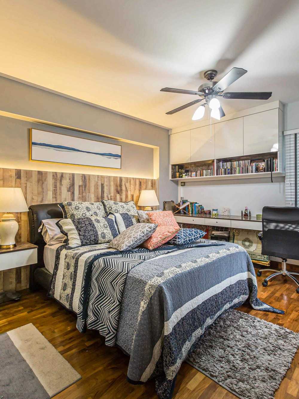 Eclectic Bedroom with Ceiling Fan and Bedside Table