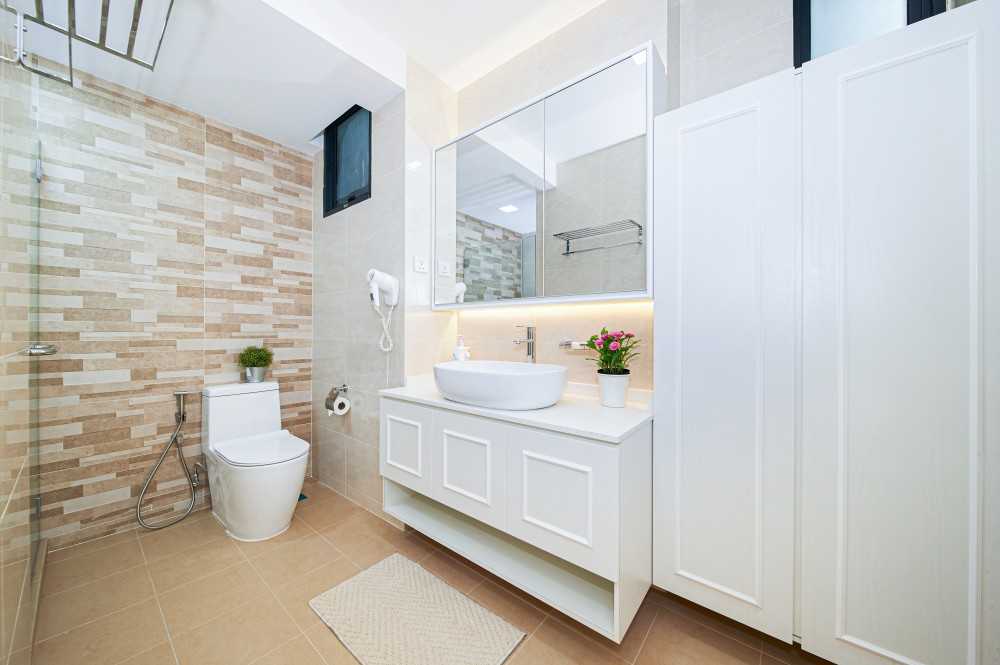 Country Bathroom with Homogeneous Tiles and Mirror
