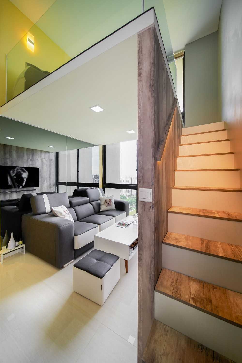 Modern Living Room with Mirror and Staircase