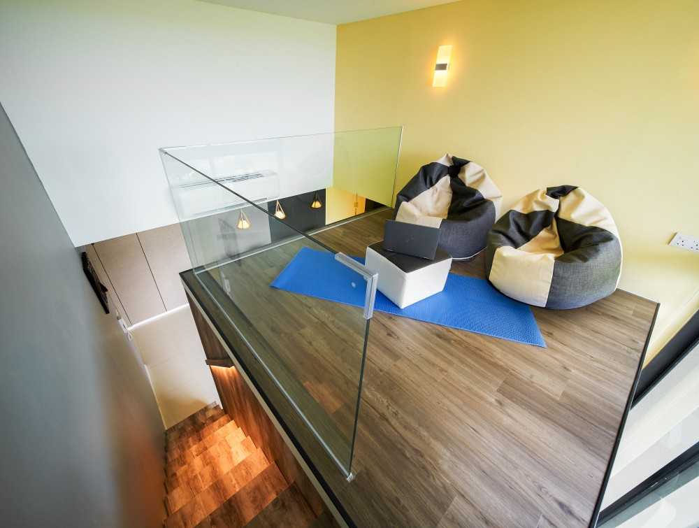 Modern Mezzanine with Feature Wall and Staircase