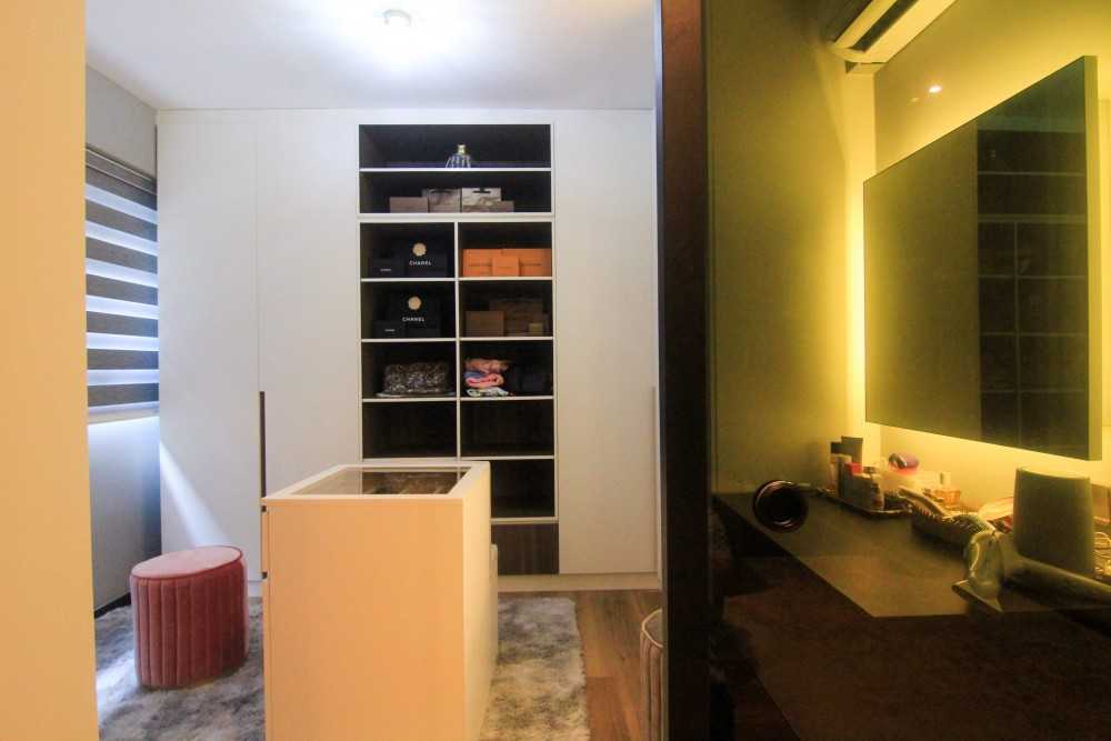 Modern Bedroom with Bookshelf and Cove Lighting