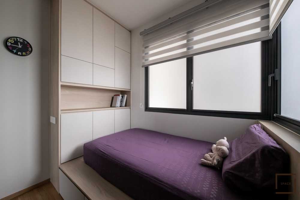 Minimalist Bedroom with Bookshelf and Sideboard