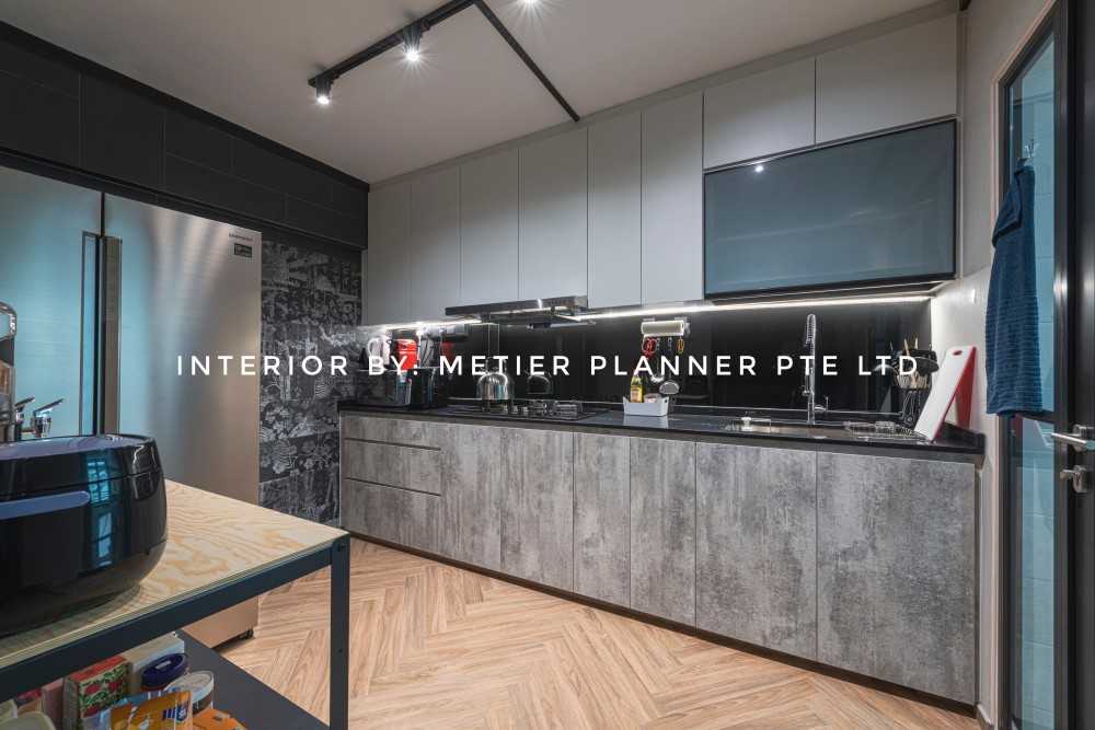 Industrial Kitchen with Countertop and Herringbone Tiling