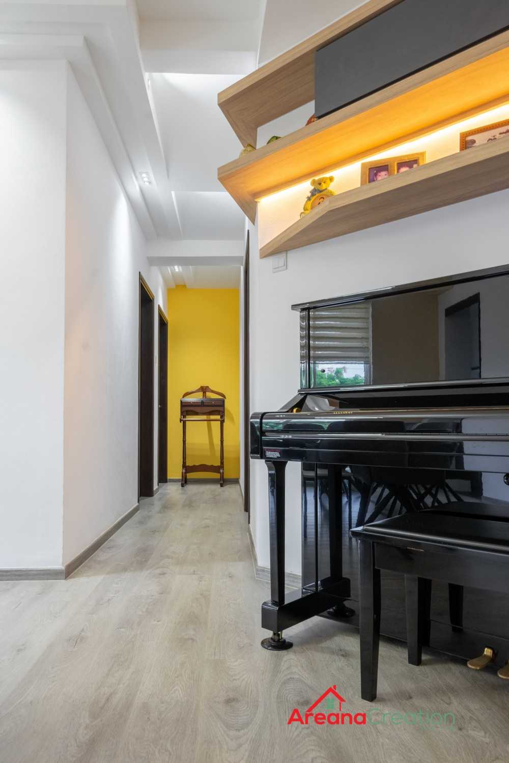Contemporary Foyer with Artwork and Console Table