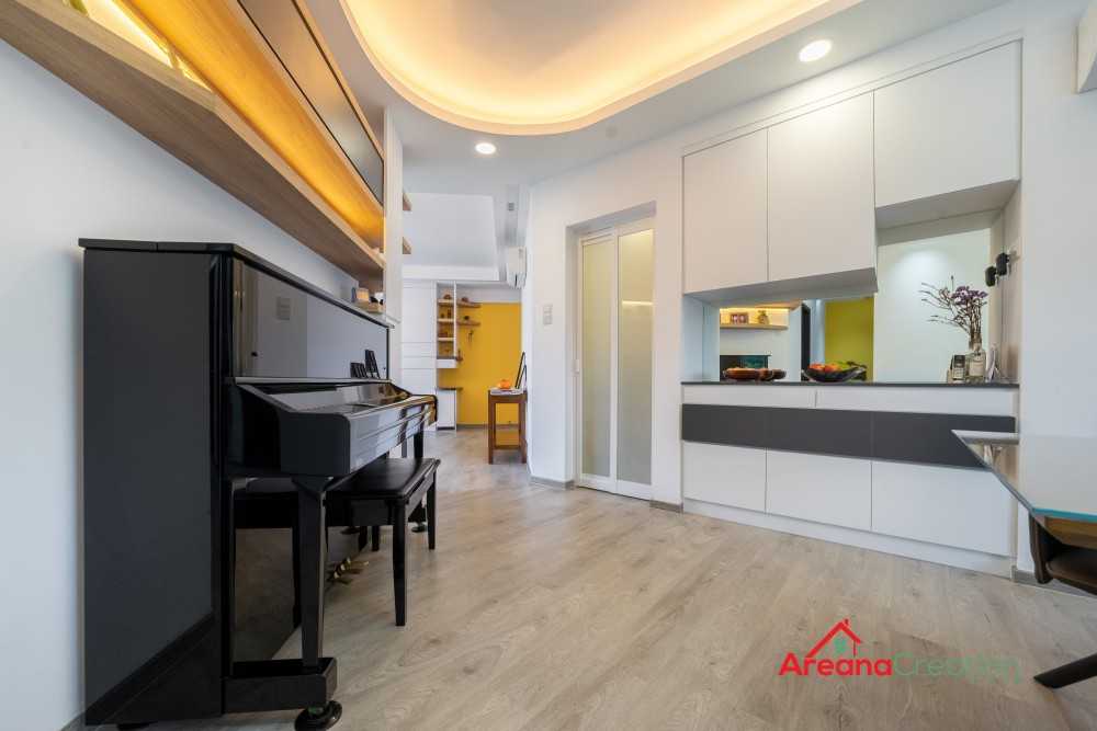 Contemporary Foyer with Cove Lighting and Downlights