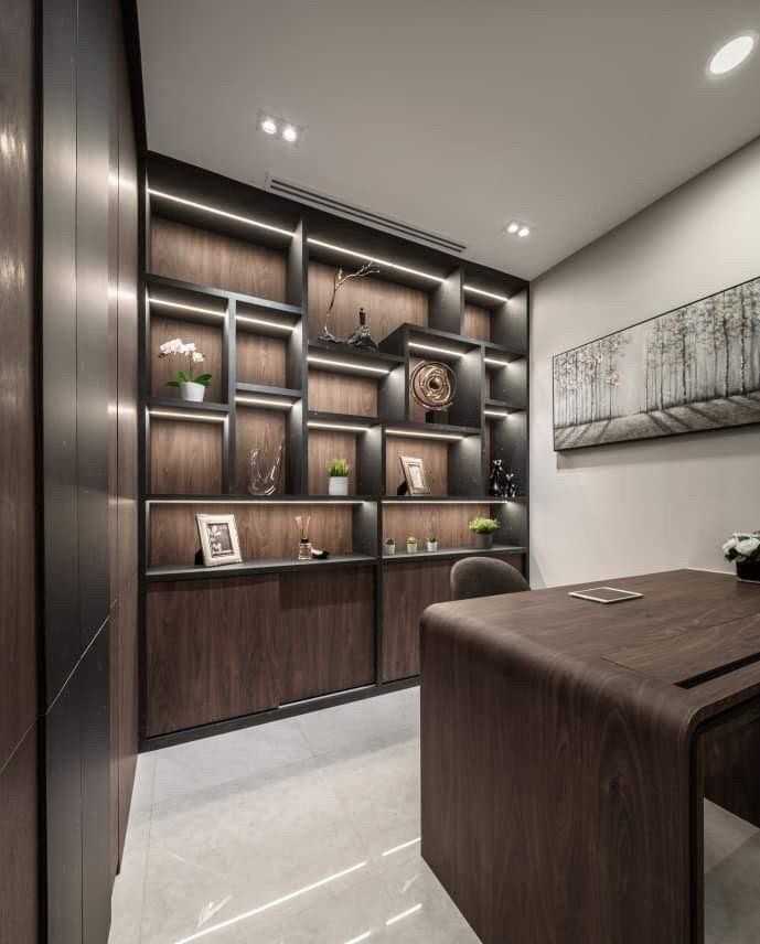 Contemporary Home Office with Bookshelf and Wallpaper