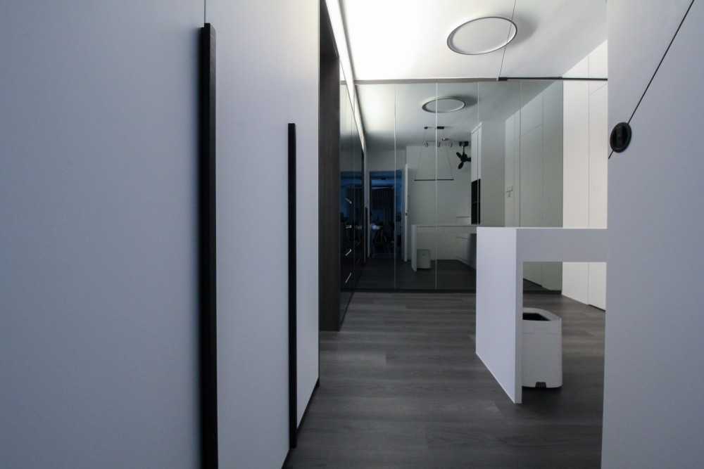 Minimalist Study with Ceiling Light and Wall Shelves