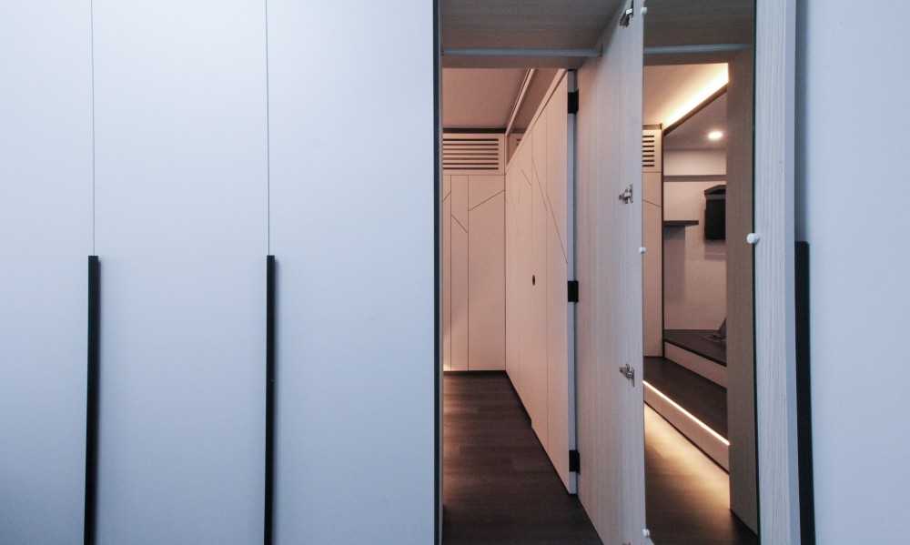 Minimalist Bedroom with Vinyl Flooring and Cove Lighting