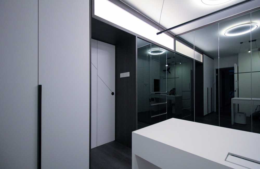 Minimalist Study with Bookshelf and Cove Lighting