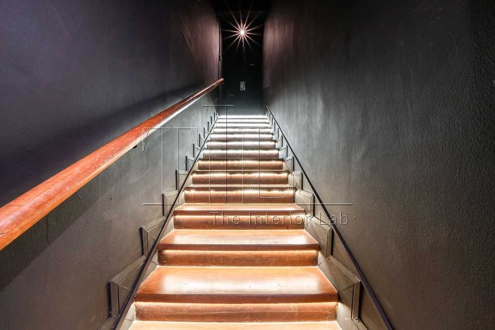 Industrial Entryway with Staircase and Metal Gate