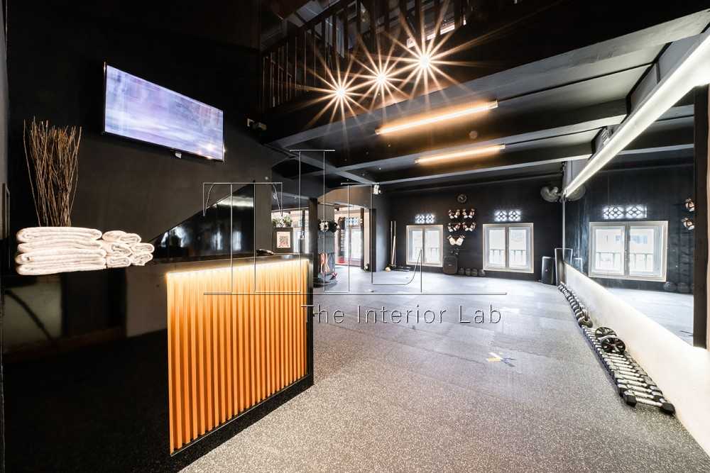 Industrial Studio with Metal Gate and Gym Equipment
