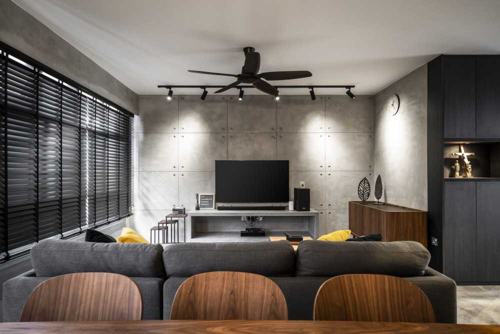 Industrial Living Room with Cement Floor and Feature Wall