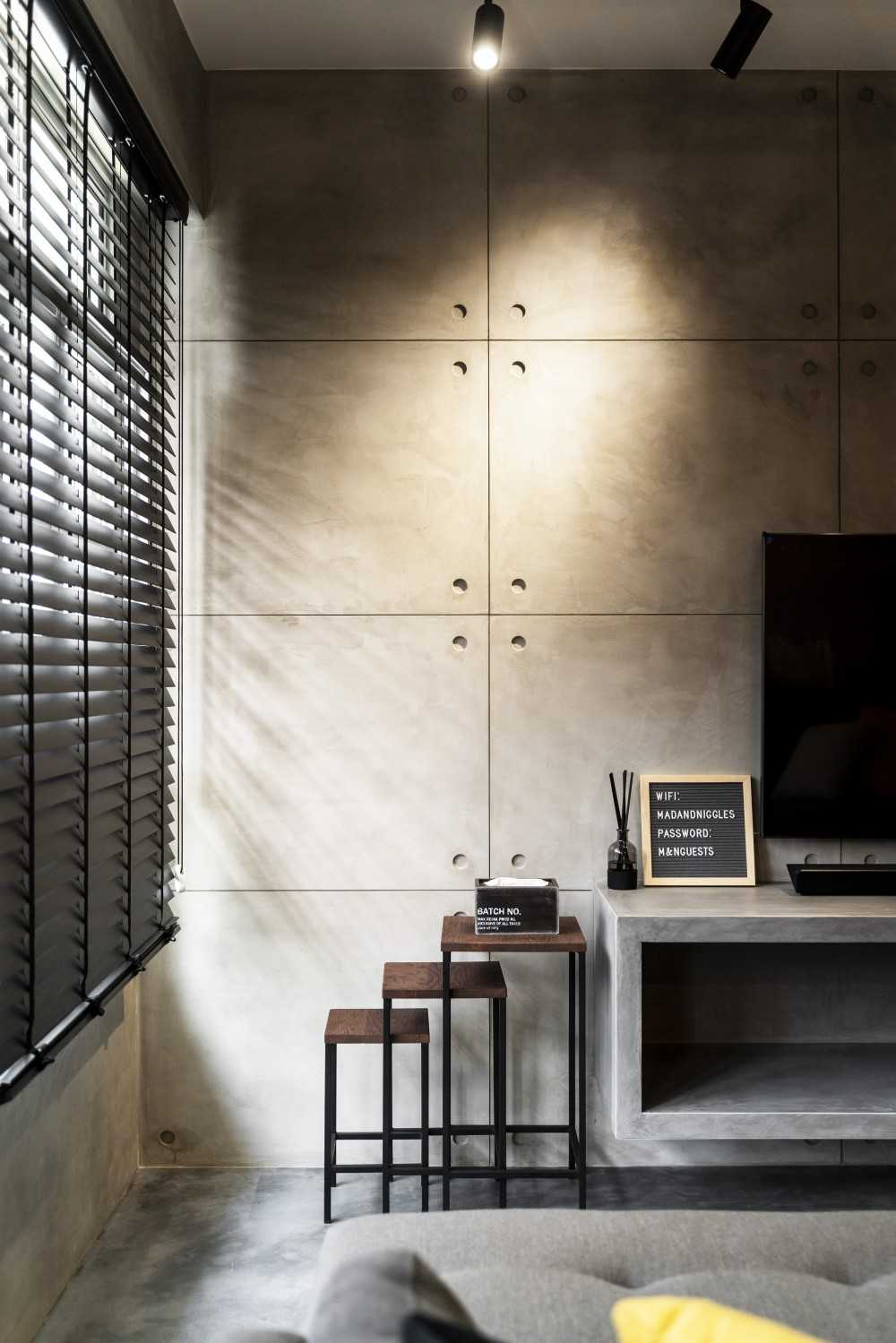 Industrial Living Room with Cement Floor and TV Console