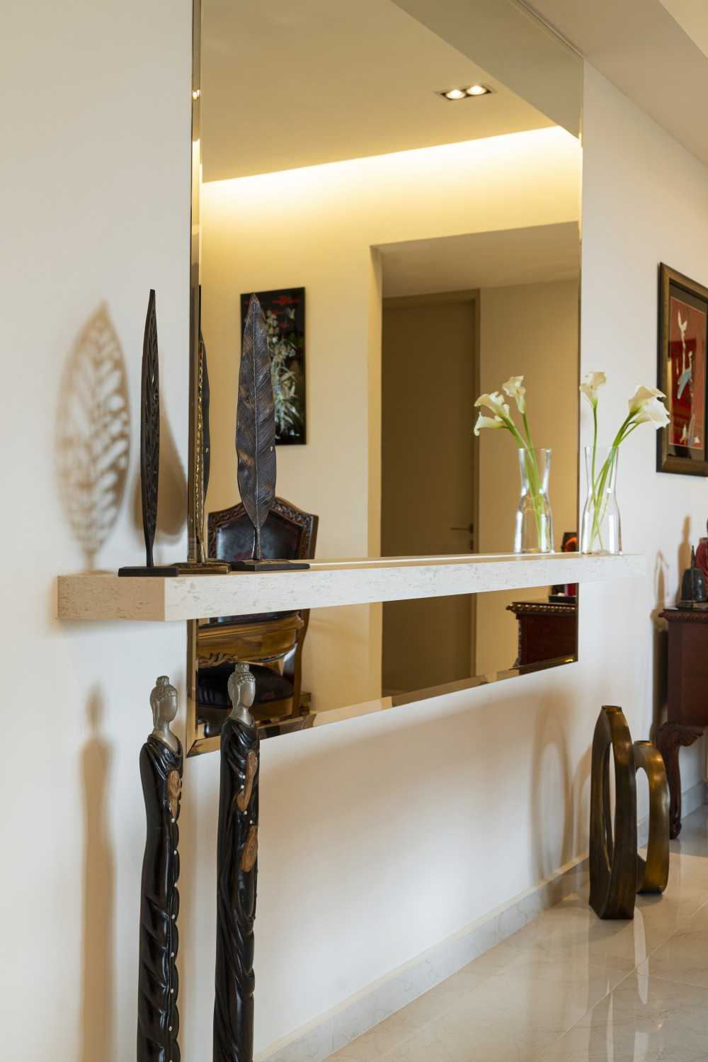 Modern Hallway with Mirror and Artwork