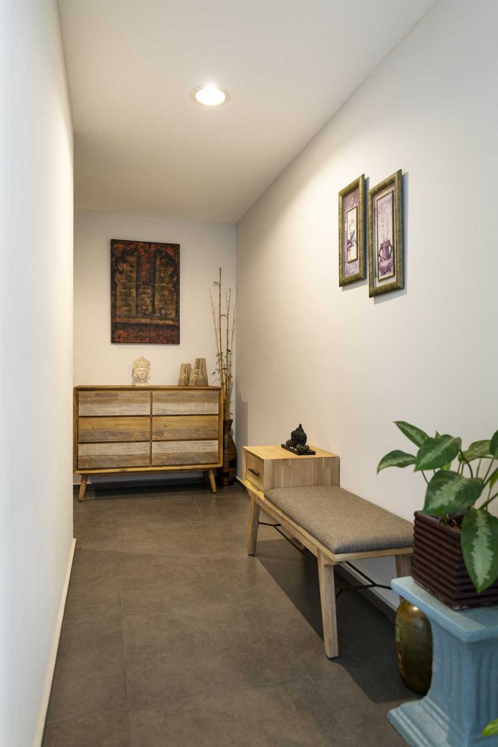 Modern Foyer with Feature Wall and Outdoor Table