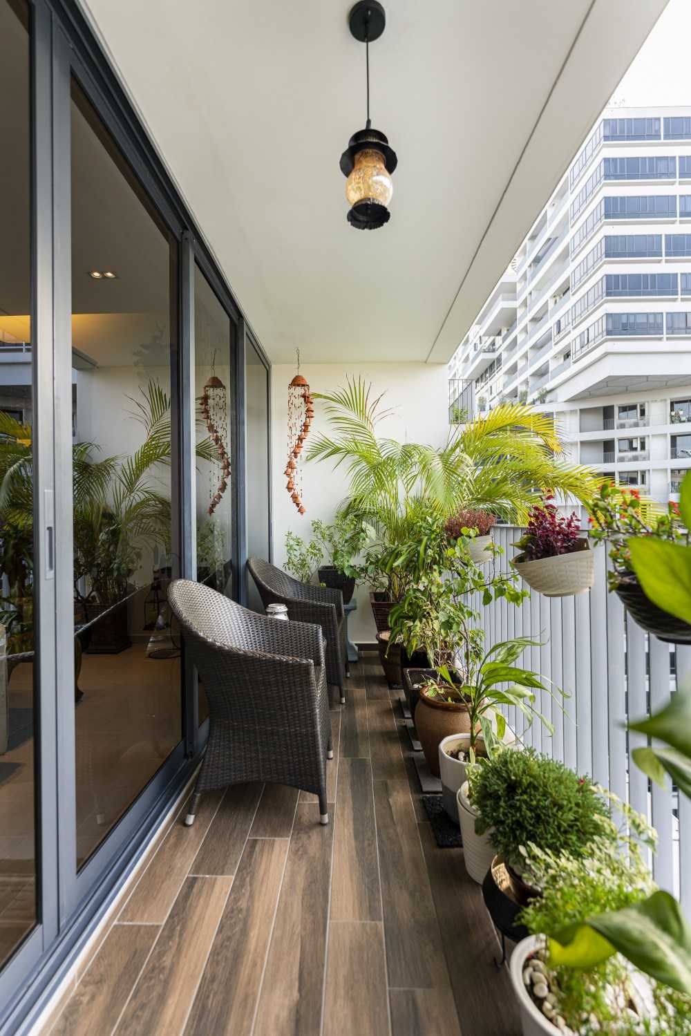 Modern Balcony with Bay Window and Outdoor Table