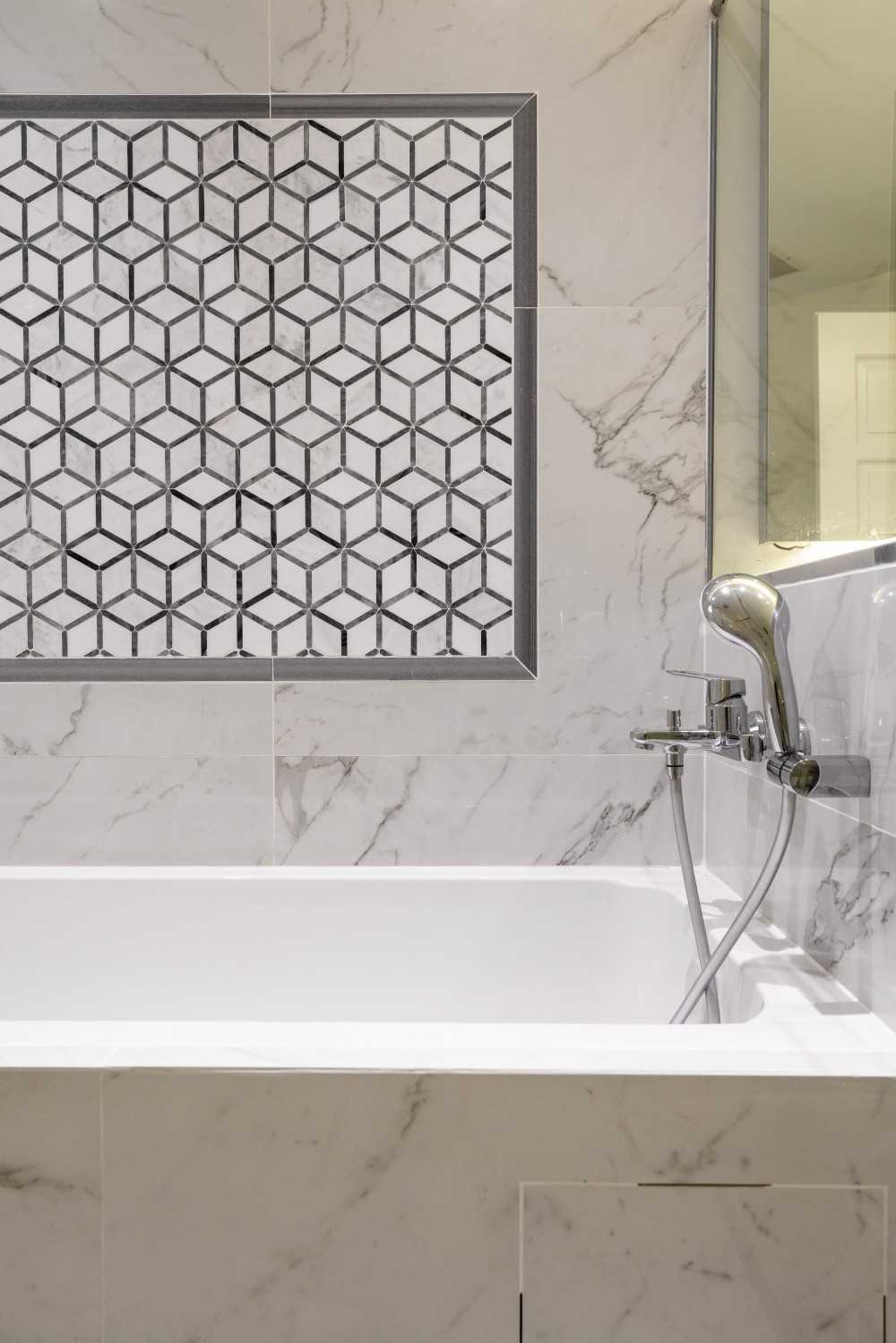Modern Bathroom with Marble Floor and Feature Wall