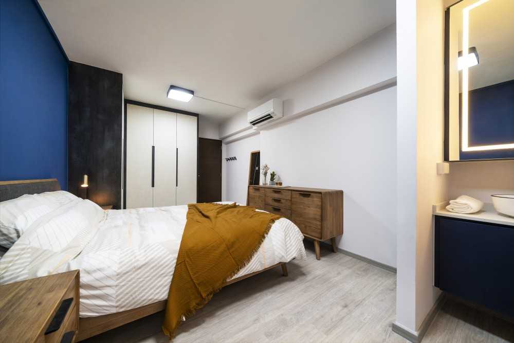 Minimalist Bedroom with Vinyl Flooring and Ceiling Light