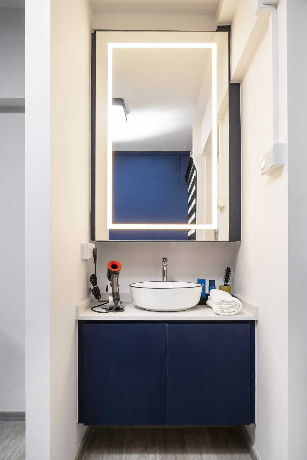 Minimalist Bathroom with Countertop and Mirror