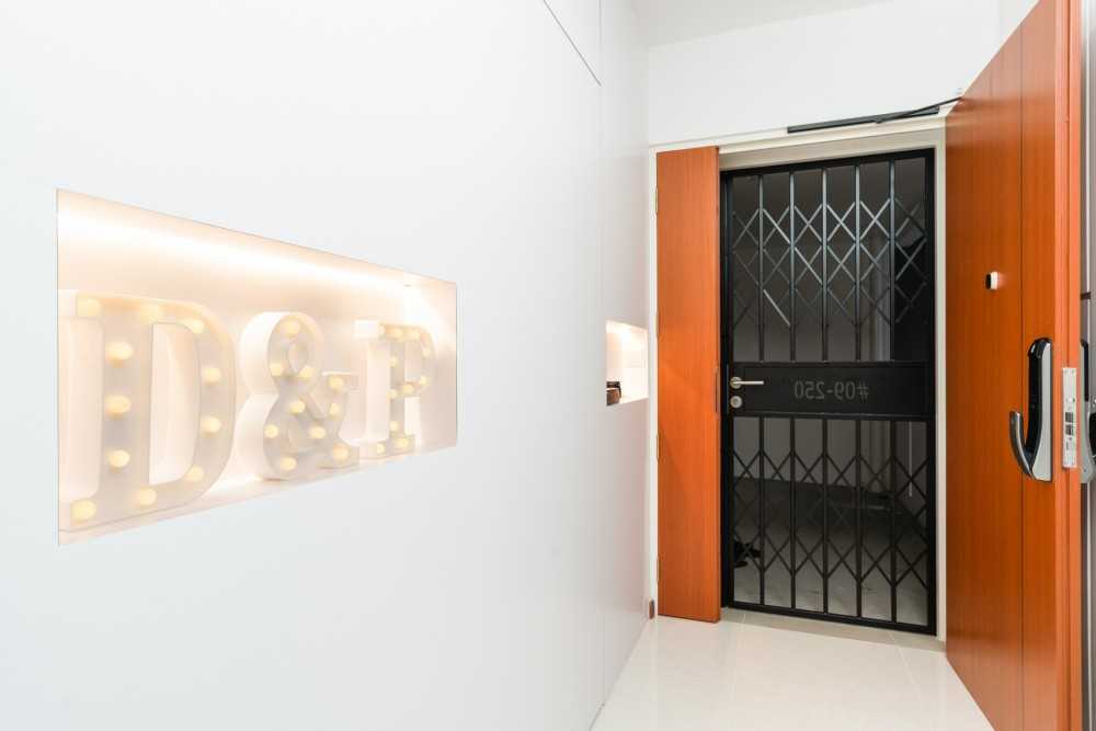 Scandinavian Entryway with Lighting and Doors