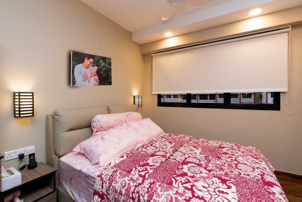 Modern Bedroom with Wood Flooring and Ceiling Light