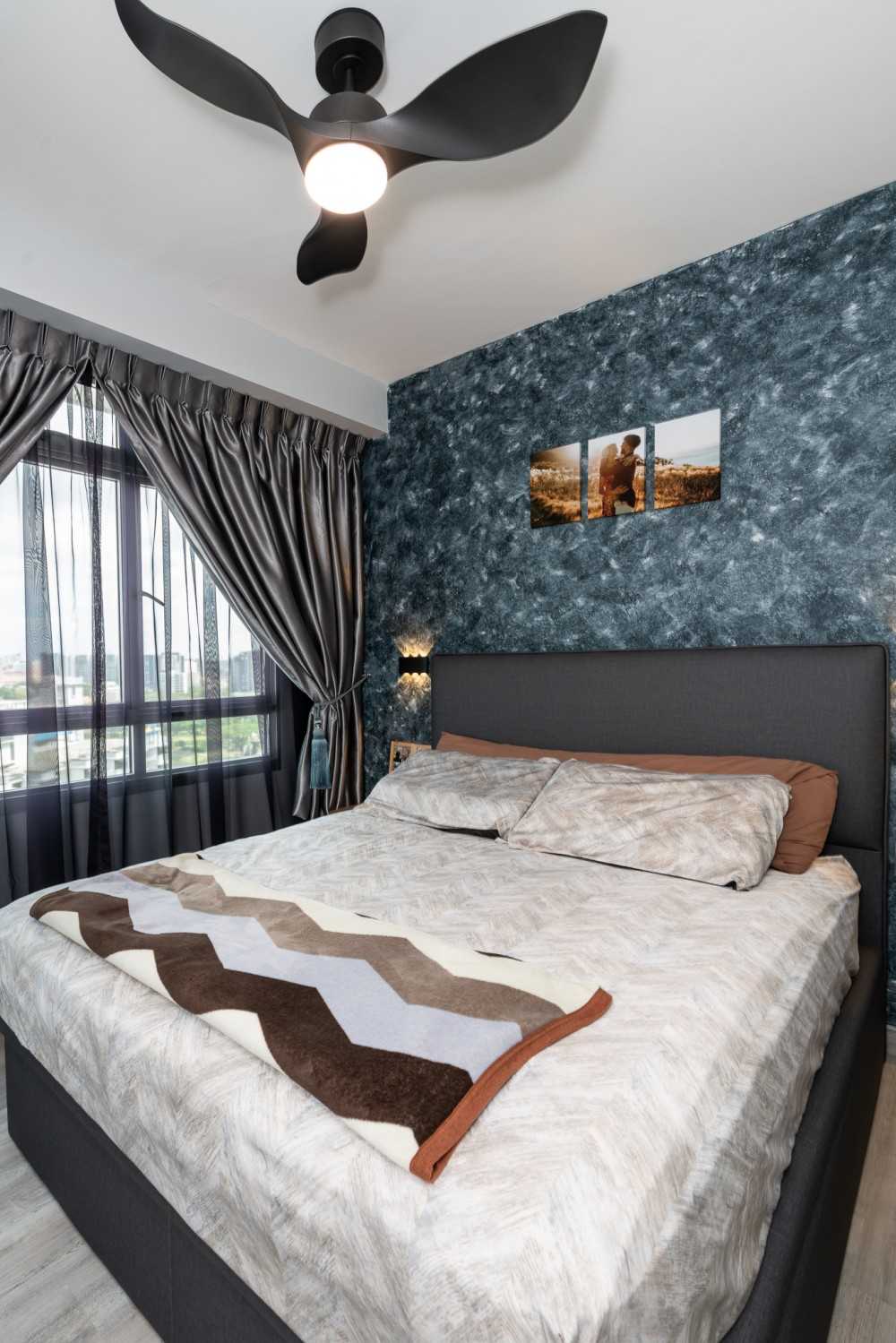 Modern Bedroom with Wood Flooring and Feature Wall