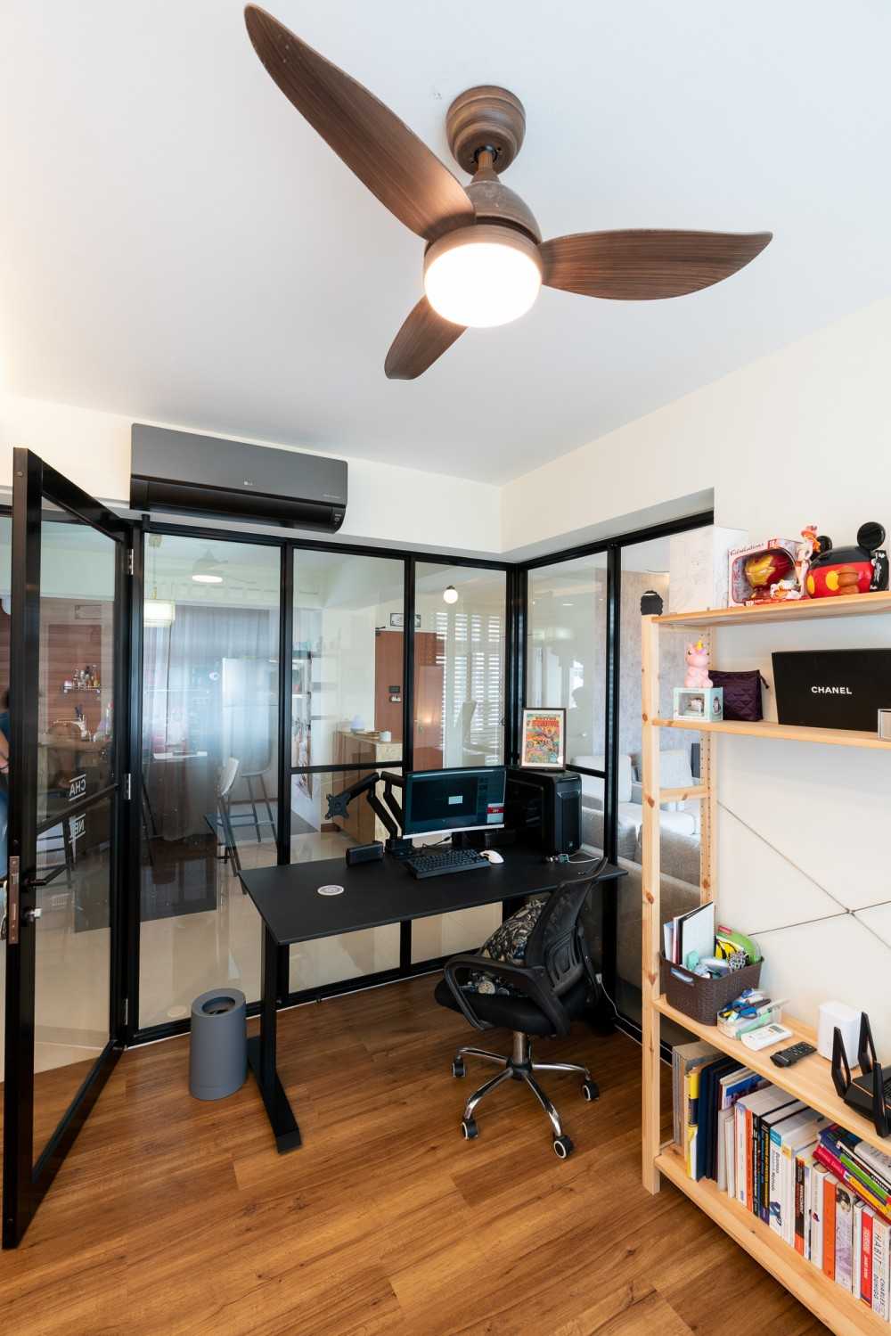 Modern Study with Bookshelf and Wood Flooring