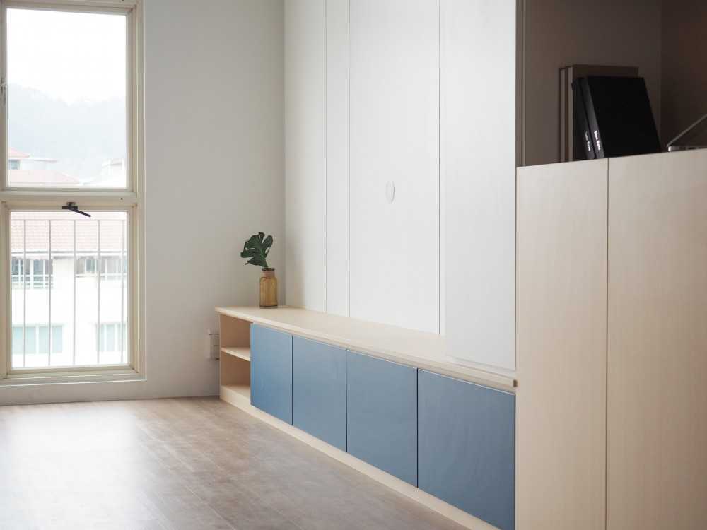 Modern Living Room with Bookshelf and Vinyl Flooring