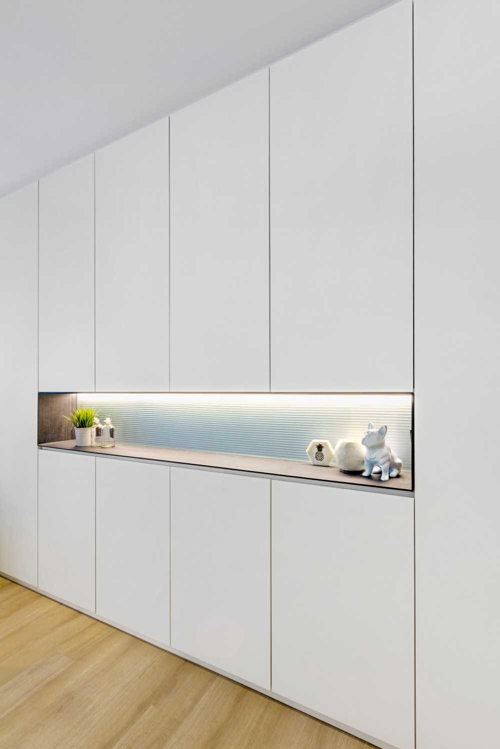 Minimalist Living Room with Vinyl Flooring and Feature Wall
