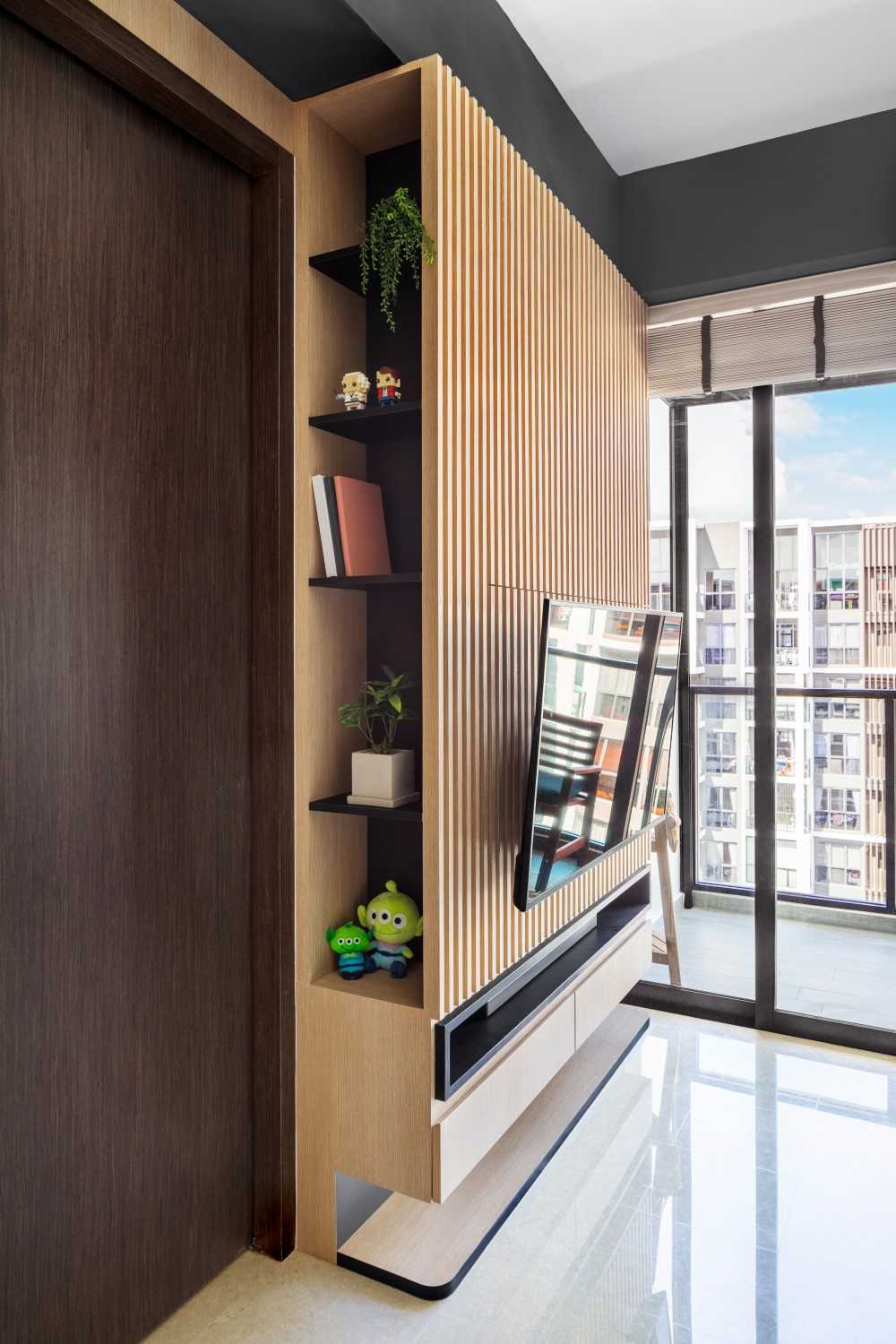 Modern Hallway with Bookshelf and Artwork