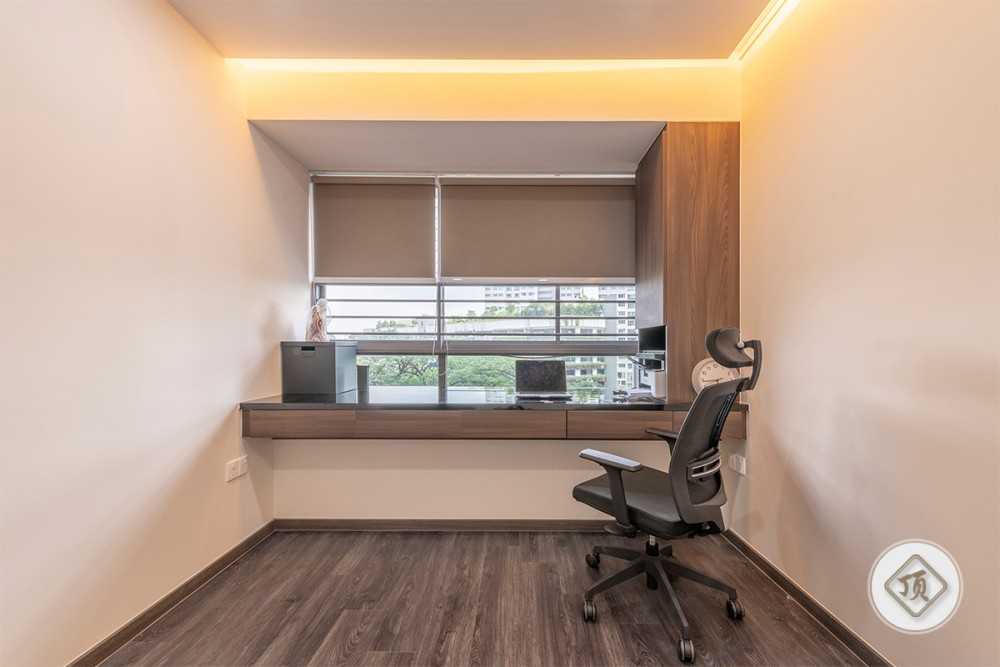 Contemporary Home Office with Bookshelf and Desk