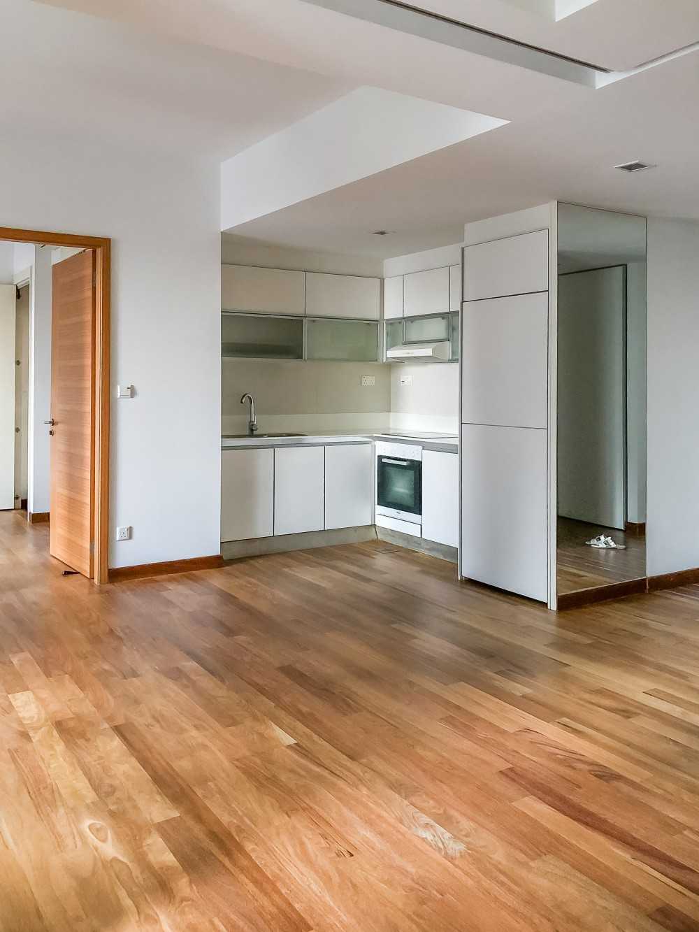 Minimalist Kitchen with Parquet Floor and Kitchen Cabinets