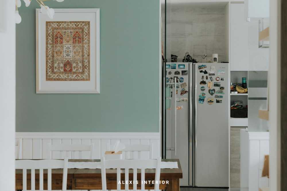 Country Dining Room with Green Wall and Dining Table