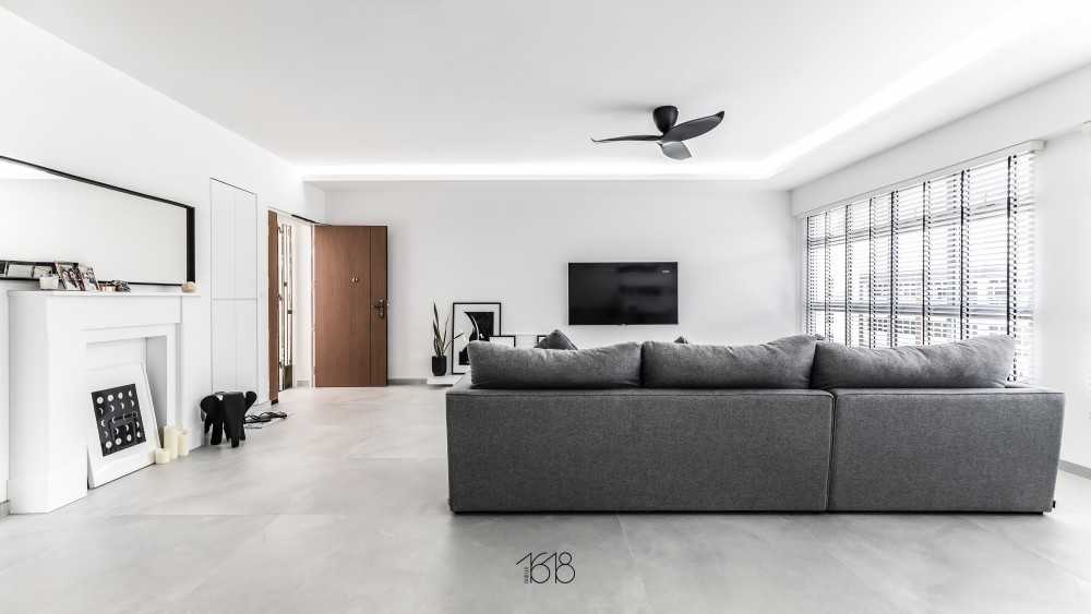 Minimalist Living Room with Homogeneous Tiles and TV Console