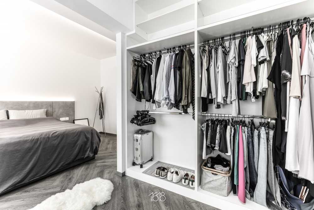Minimalist Walk-in Wardrobe with Vinyl Flooring and Herringbone Tiling