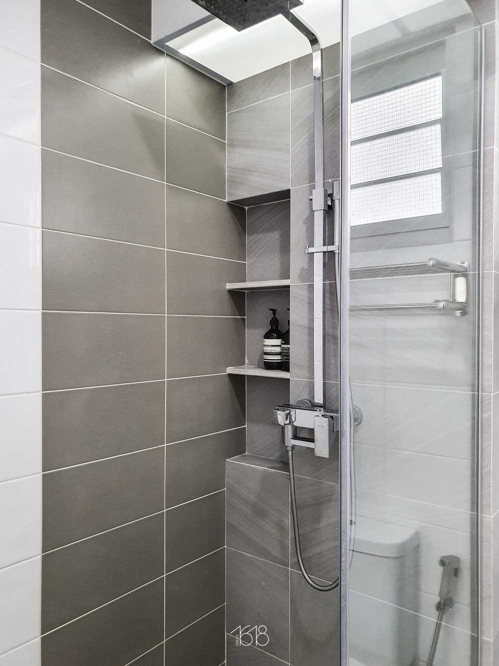 Minimalist Bathroom with Homogeneous Tiles and Shower Screen